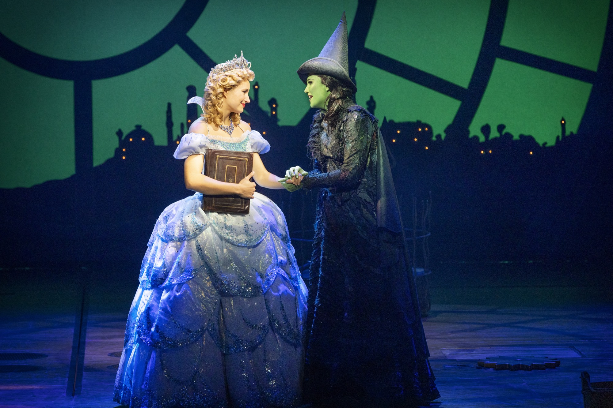 Courtney Monsma and Sheridan Adams as Glinda and Elphaba in Wicked the musical at Melbourne's Regent Theatre.